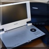 E12. Toshiba portable DVD player. 